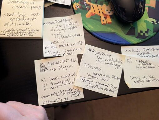 A bunch of sticky notes with handwritten scribble on them related to this blog post